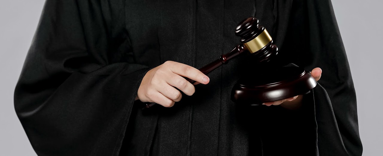 front-view-female-judge-with-gavel